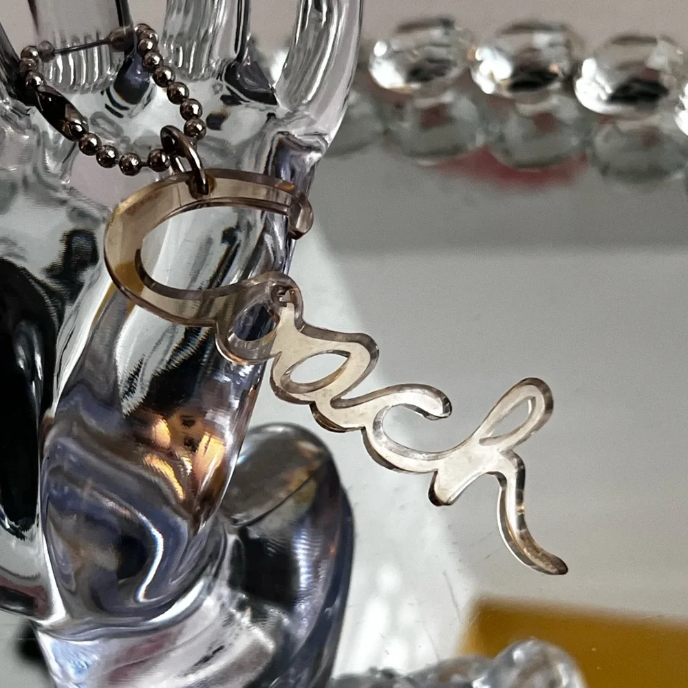 Coach poppy Y2K clear Metallic Gold Script Keychain or bag tag